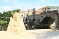 Sand statue by Stone Bridge in Pisek Royalty Free Stock Photo