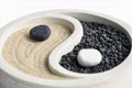 Sand and stone symbol with Yin and Yang