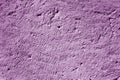 Sand stone uneven surface as background in purple tone