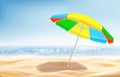 Summer seascape, sunny sandy beach with color umbrella