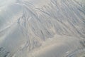 Sand surface with irregural wind pattern after storm Royalty Free Stock Photo