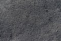 Sand surface with traces of raindrops closeup. Nature texture background Royalty Free Stock Photo