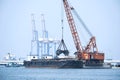 Sand tanker at the sand loading station with loader Royalty Free Stock Photo