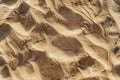 Sunlit Sandy Beach Texture with Ripples Royalty Free Stock Photo