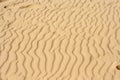 Sand texture.Dented wave of the blow Royalty Free Stock Photo