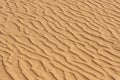 Sand texture.Dented wave of the blow of the wind. Royalty Free Stock Photo