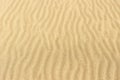 Sand texture Dented wave of the blow of the wind. Royalty Free Stock Photo