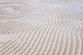 Sand texture.Dented wave of the blow of the wind Royalty Free Stock Photo
