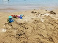 Sand texture. Sandy beach for background. Child toys. Top view Royalty Free Stock Photo