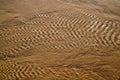 Sand texture wave art low tide tropical beach water on sandy background Royalty Free Stock Photo