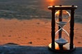 Sand timer with sunset glow Royalty Free Stock Photo