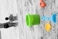 Sand toys and family on beach Royalty Free Stock Photo