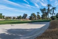 Sand trap or bunker near a golf green Royalty Free Stock Photo