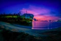 Sand-trapped Ship at Arabian ocean in Kerala seashore Royalty Free Stock Photo