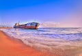 Sand trapped ship in kollam beach Royalty Free Stock Photo