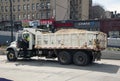 Sand truck with sanitation worker and police talk during opening