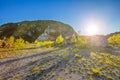 Sand vegetation clifs mountain blue sky