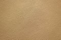 Sand wall brown color with fine rugged sand detail emboss exterior wall building decoration texture pattern background