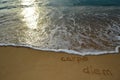 Sand writing 'carpe diem' Royalty Free Stock Photo