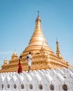 Sanda Muni Paya Mandalay Myanmar, young couple on vacation in Myanmar walking by temple Royalty Free Stock Photo