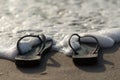 Sandals in the beach Royalty Free Stock Photo