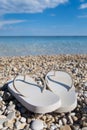 Close Up Of Sandals On Beautiful Greek Beach Royalty Free Stock Photo