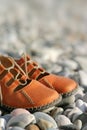 Sandals on a pebbled beach