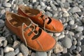 Sandals on a pebbled beach