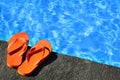 Sandals by a pool