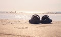 Sandals on the sandy beach Royalty Free Stock Photo