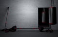 Sandbag with dumbbells and Barbells color black in fitness room at home. Gray Plaster and dirty old wall. Fitness equipment for