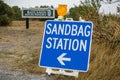 Sandbag Station sign on a rainy day when there is a risk of flooding; Palo Alto, San Francisco bay area, California