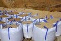 Sandbag white big bag sand sacks quarry Royalty Free Stock Photo