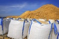 Sandbag white big bag sand sacks quarry Royalty Free Stock Photo