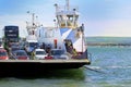 Sandbanks, Dorset, England - June 02 2018: Cars and a bus on board the Sandbanks Chain Ferry which crosses the entrance of Poole H