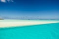 Sandbar flooded by clear water of South Pacific Ocean, Aitutaki, Cook Islands Royalty Free Stock Photo