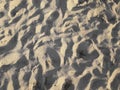 Sandbeach sand with hidden child footprint Royalty Free Stock Photo
