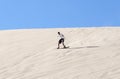 Sandboarding in Atacama desert Royalty Free Stock Photo