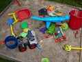 Sandbox with colorful toys