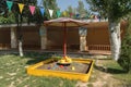 Sandbox in a kindergarten with toys for playing in the sand Royalty Free Stock Photo