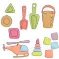 Sandbox toy set, colorful cubes, bucket, shovel, sandbox, pyramid, helicopter, sand molds Royalty Free Stock Photo