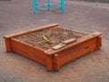 Sandbox with toys in the playground in the spring