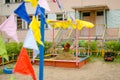 Sandbox with wind toys in the sand on playground