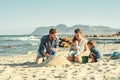 Sandcastle building, parents and children at beach with bonding, love and support. Baby, mom and dad together with kids Royalty Free Stock Photo