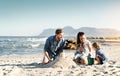 Sandcastle, happy summer and children at the beach with bonding, love and support. Baby, mom and dad together with kids Royalty Free Stock Photo