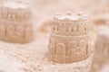 Sandcastle on the sand of a beach for child playing sand on the beach on summer holidays