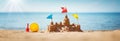 Sandcastle on the sea in summertime Royalty Free Stock Photo