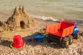 Sandcastle on the shore. Royalty Free Stock Photo