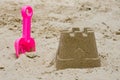 Sandcastle with a shovel