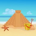 Sandcastle on tropical beach. Mayan pyramid made from sand. Seaside landscape background. Summer holiday vacation Royalty Free Stock Photo